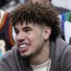 lamelo ball smiling with grill