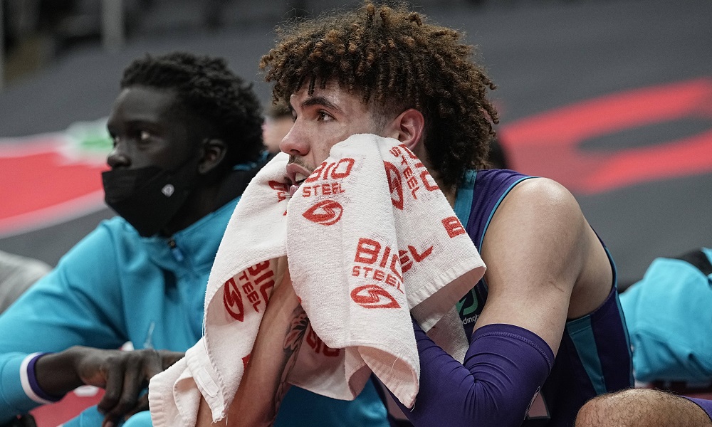 LaMelo looks concerned on bench