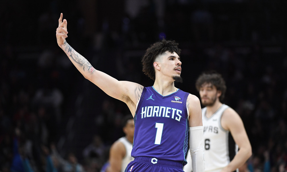 LaMelo Ball throws a hand up in celebration after knocking down a shot against the San Antonio Spurs