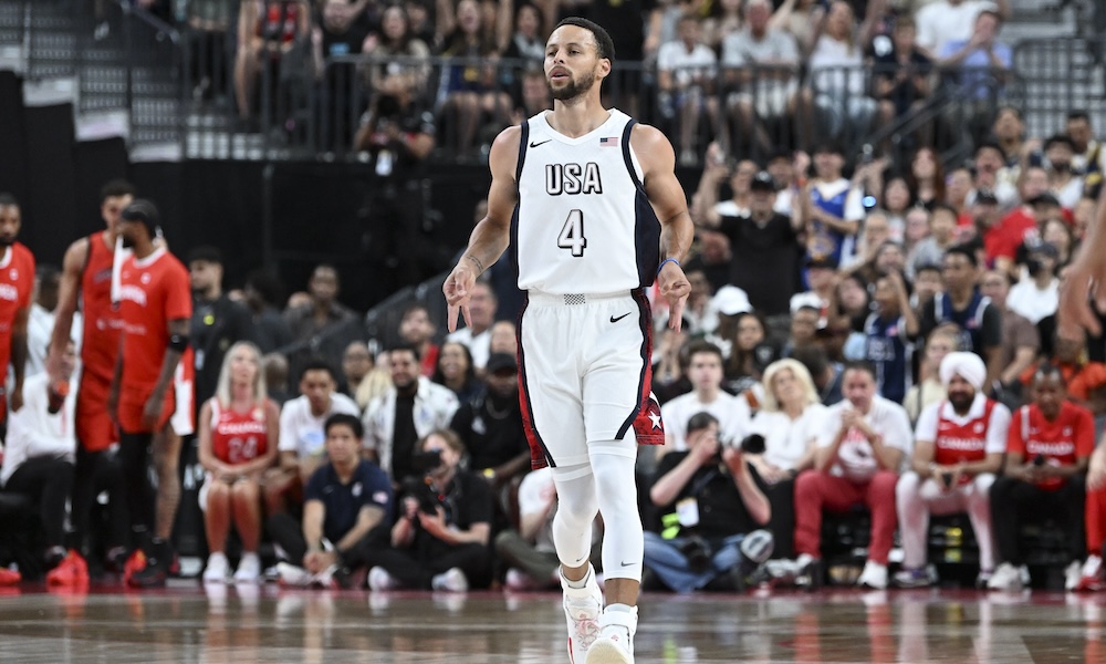 Steph knocks down a huge 3-pt and glances at bench