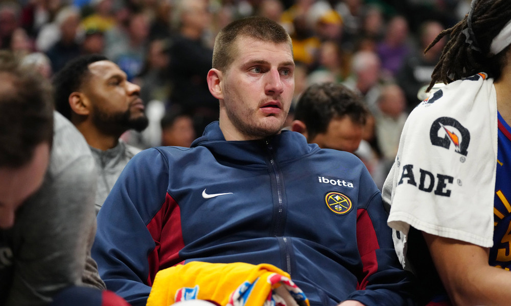 Nikola Jokic sitting on the bench
