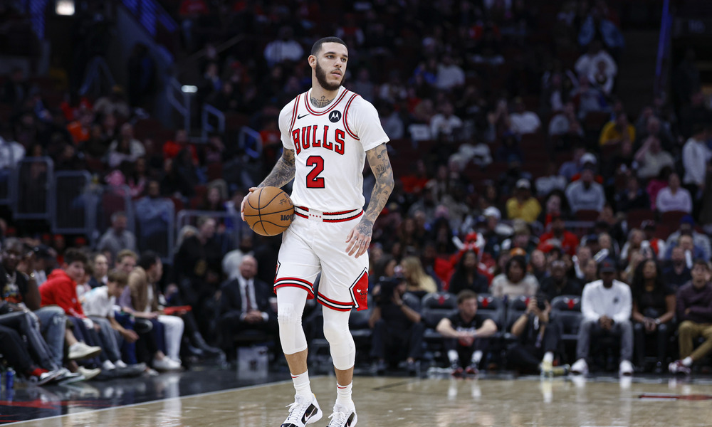 Lonzo Ball dribbling the ball up the floor