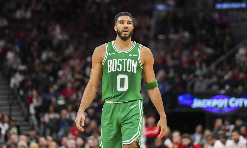 Jayson Tatum waiting for play to resume during a preseason game