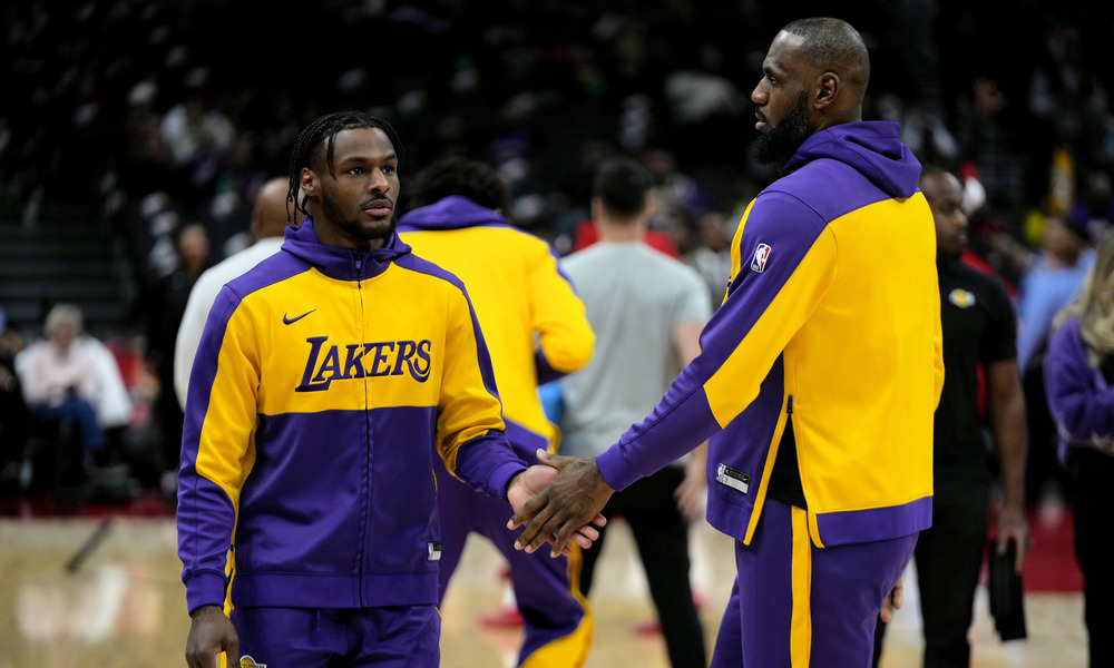 LeBron and Bronny James shaking hands during pregame warmups