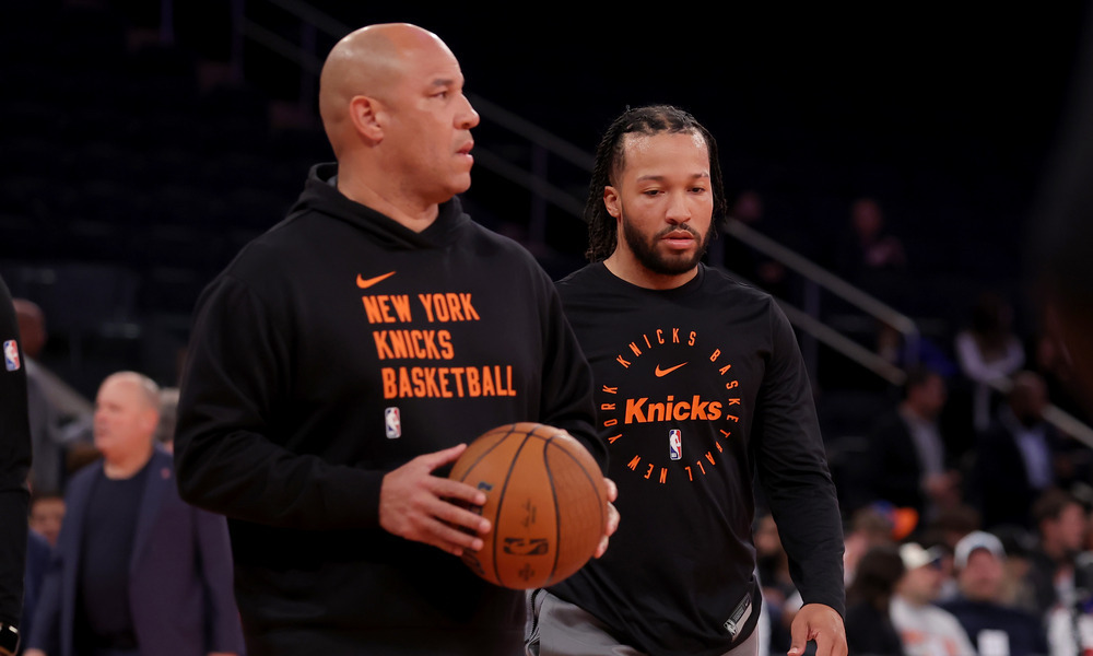Jalen and Rick Brunson on the court together warming up