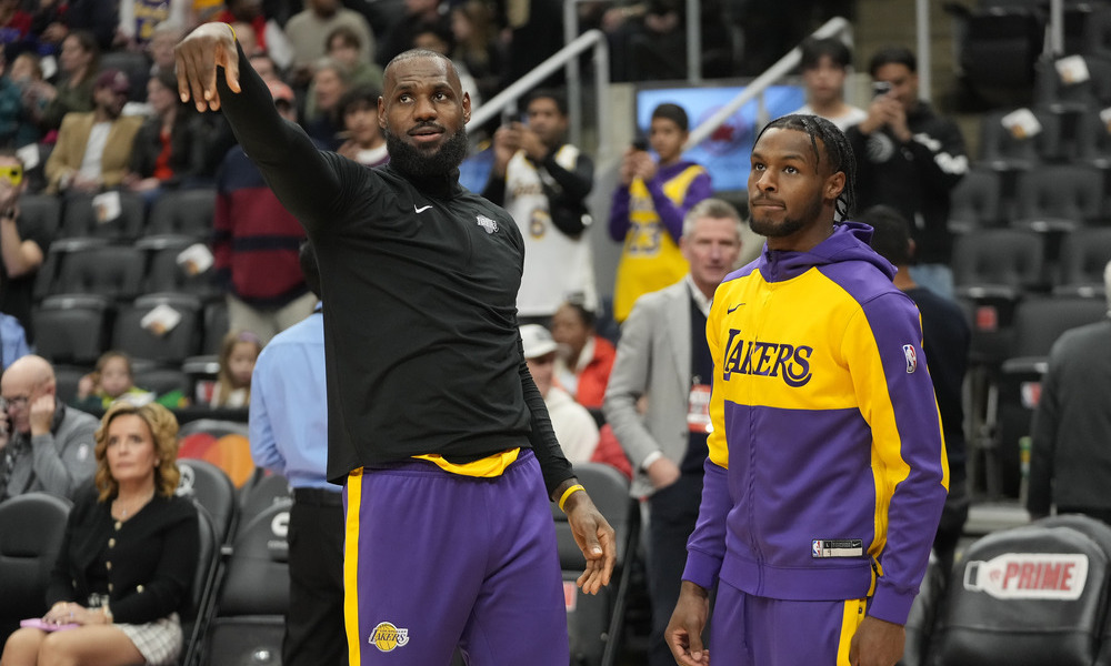 LeBron and Bronny James warming up before a game