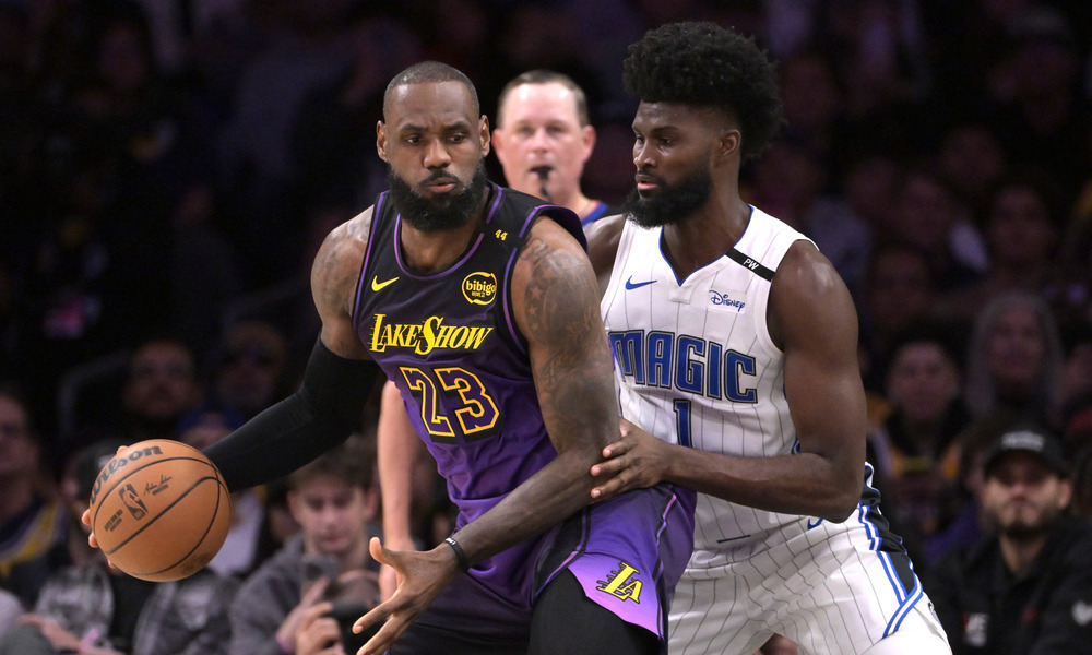 LeBron James backing down Johnathan Isaac in the post