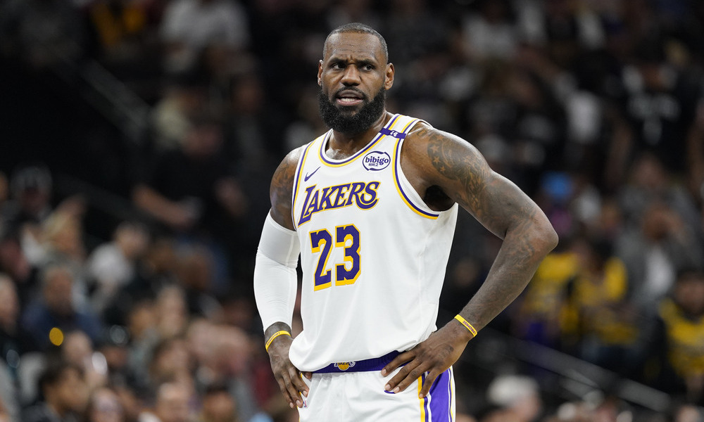 LeBron James standing on the court, waiting for play to resume