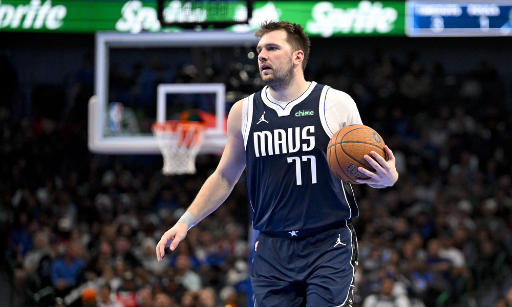 Luka Doncic dribbling the ball up the court