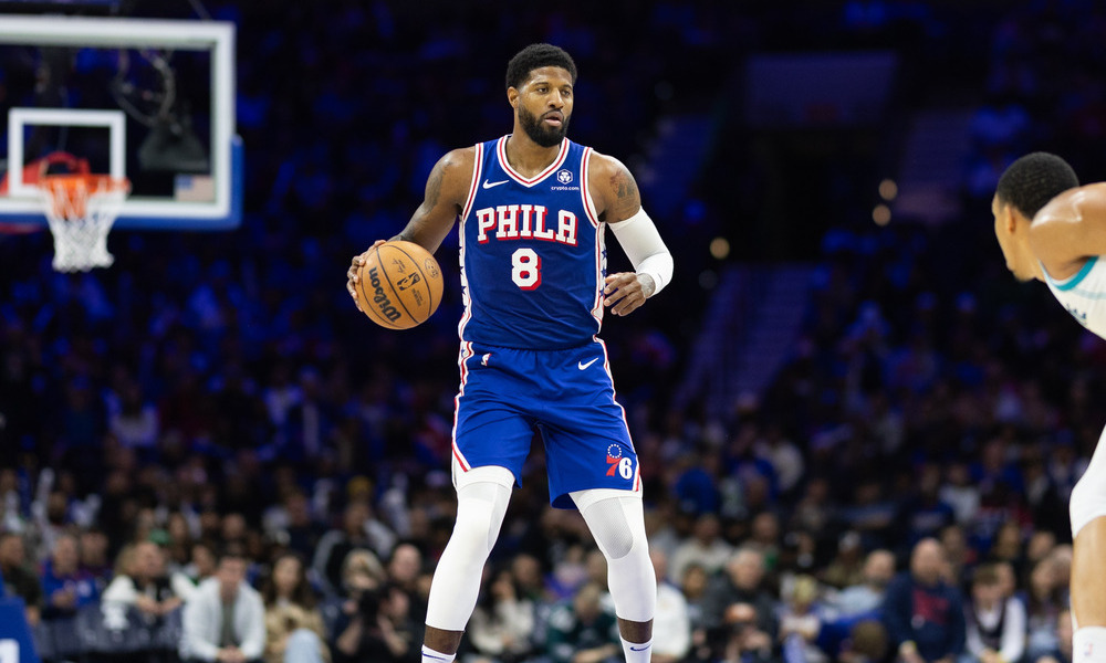 Paul George looking up the floor as a play develops