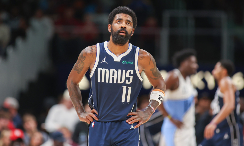 Kyrie Irving catching his breath during a stoppage of play.