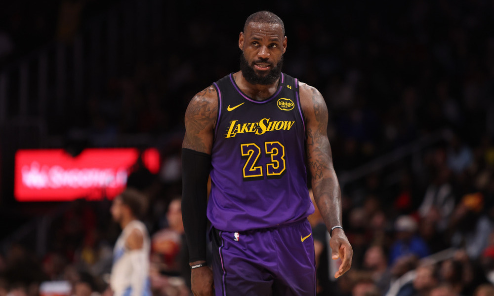 LeBron James walking to the bench during a timeout of Friday's overtime game