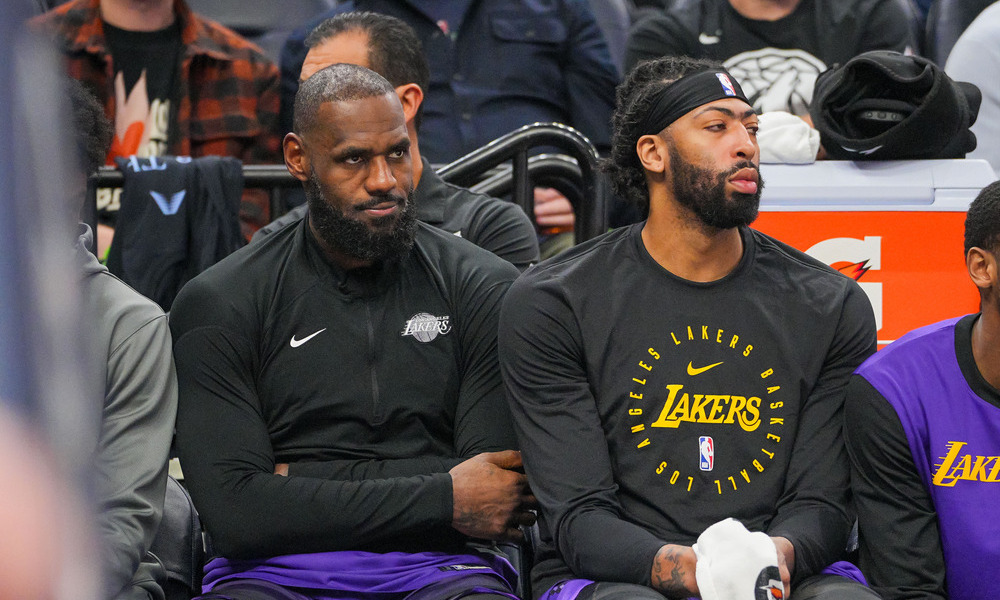 LeBron James and Anthony Davis sitting on the bench as Monday night's game came to a close.