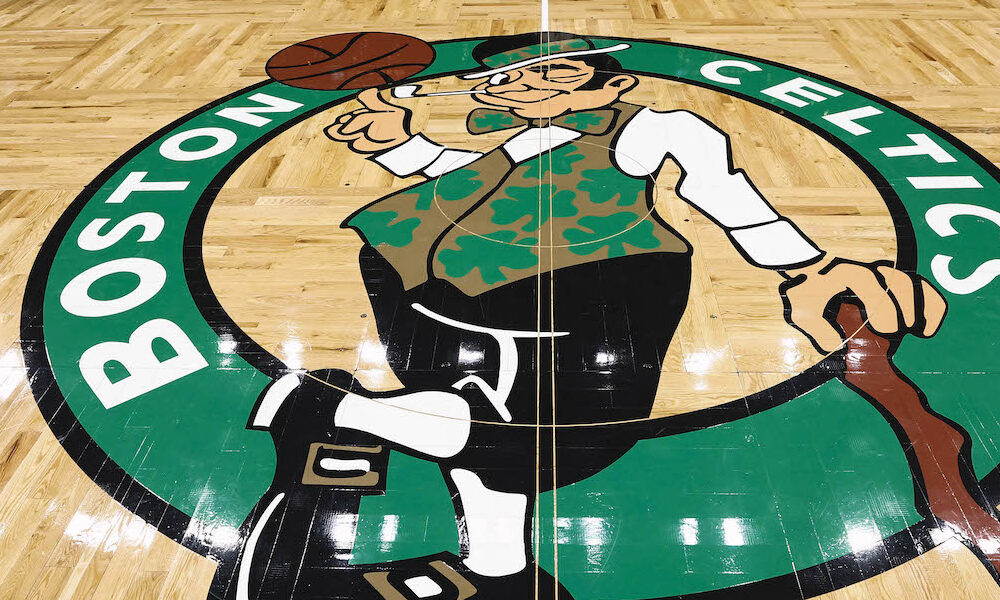 Boston Celtics logo in the middle of the court at TD Garden for 2025 matchup against the Cavaliers.