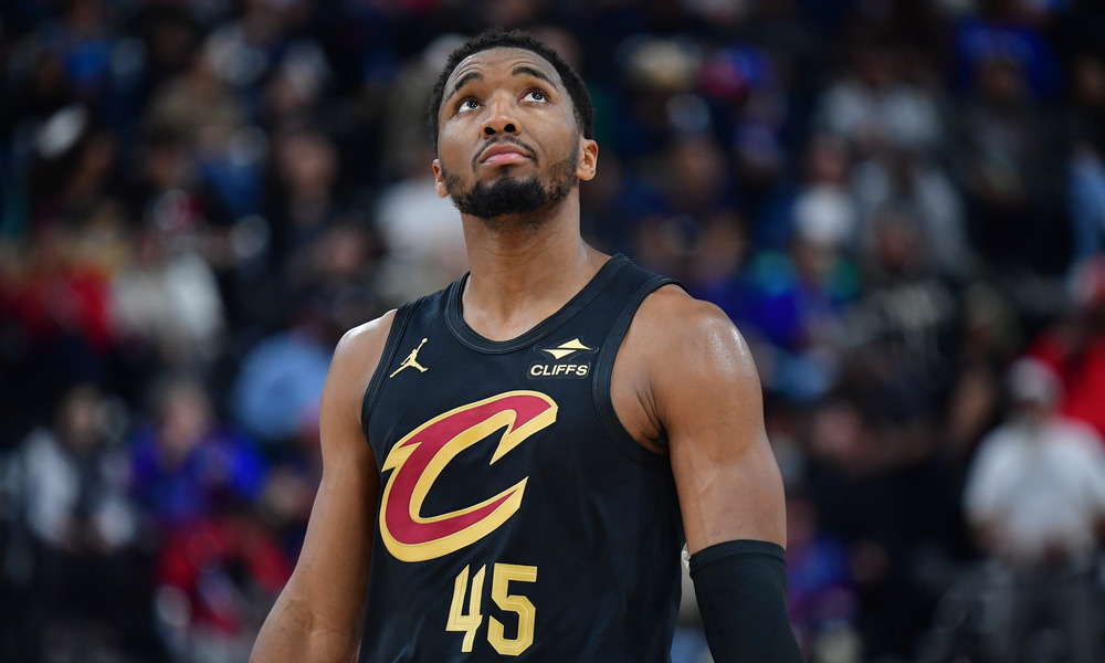 Donovan Mitchell looks up at the scoreboard during a stoppage of play.