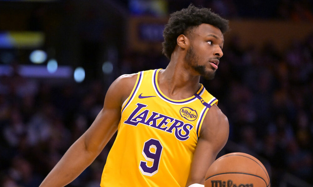 Lakers guard Bronny James (No. 9) on the court in 2025 matchup against Denver Nuggets.
