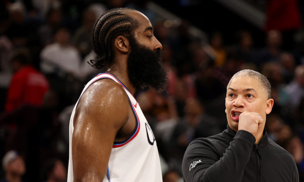 Clippers guard James Harden talking to head coach Ty Lue on the sideline in Sunday's game versus Thunder.