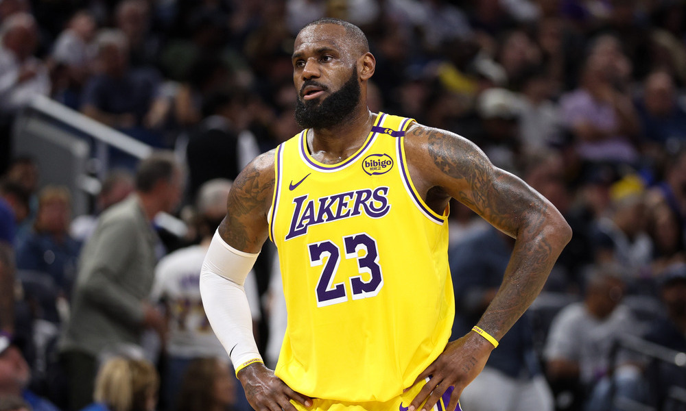 LeBron James looking up at the scoreboard during a pause in play.
