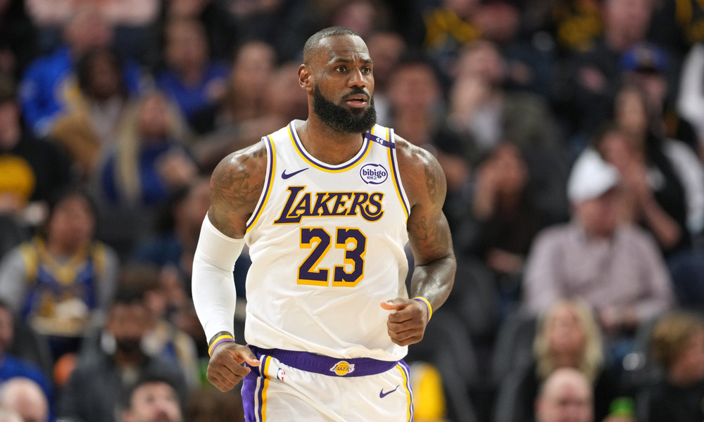 LeBron James running back on defense.