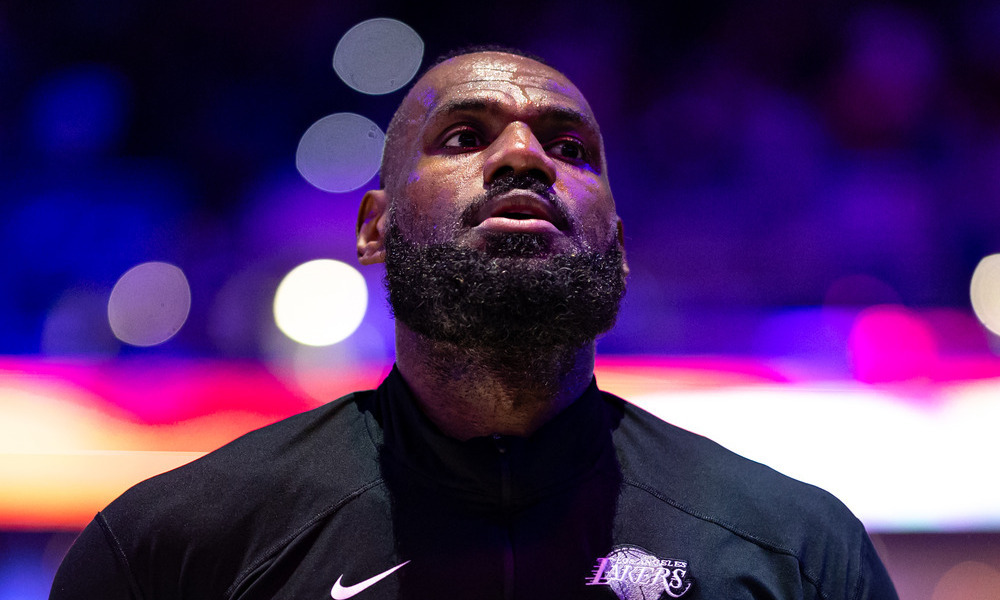 LeBron James focusing during the singing of the National Anthem.