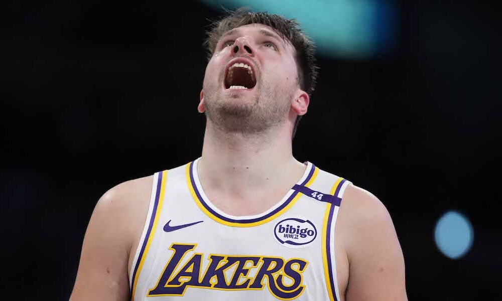 Los Angeles Lakers guard Luka Doncic (77) reacts to a big play in Sunday's matchup versus the Phoenix Suns.