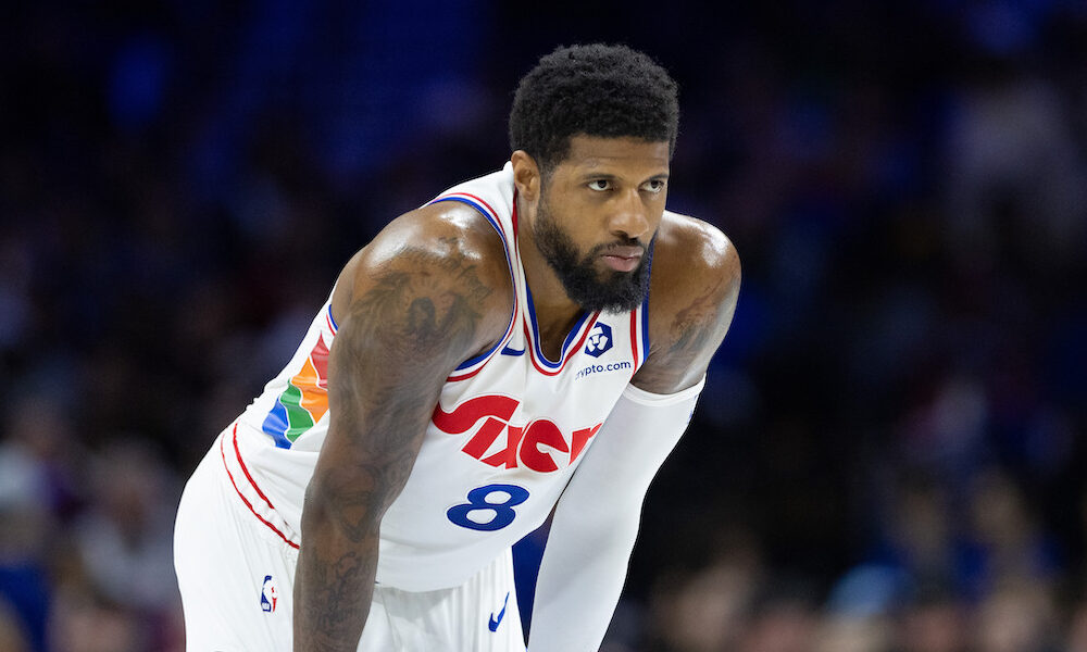 76ers star forward Paul George looks on in matchup against Golden State Warriors in 2025 matchup.