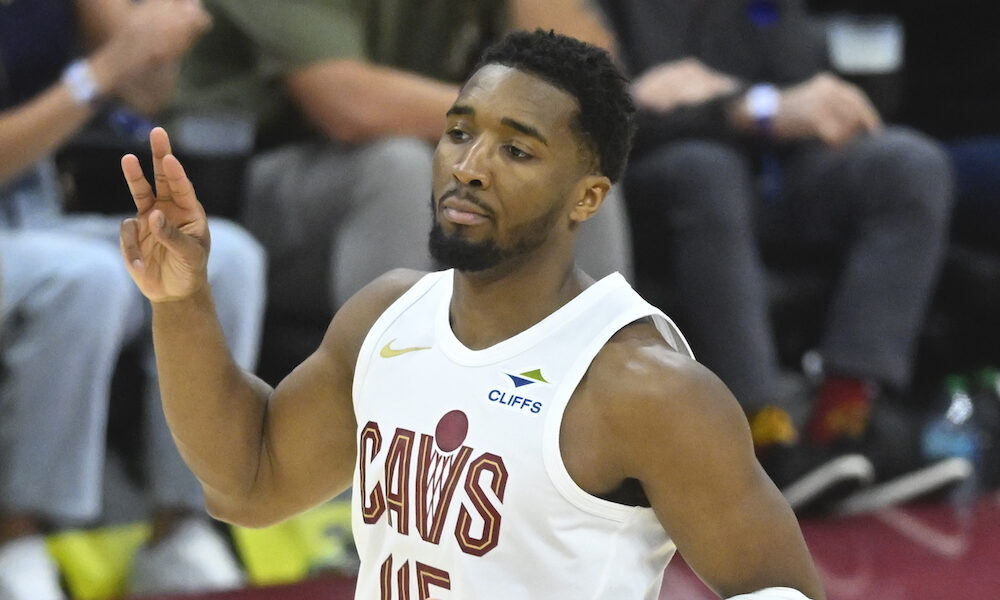 Cavs guard Donovan Mitchell celebrates made 3-point shot in 2025 game versus Magic.