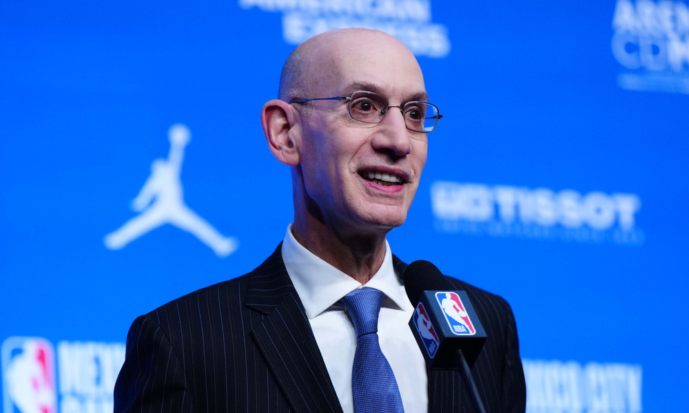 Adam Silver addresses reporters at a press conference.