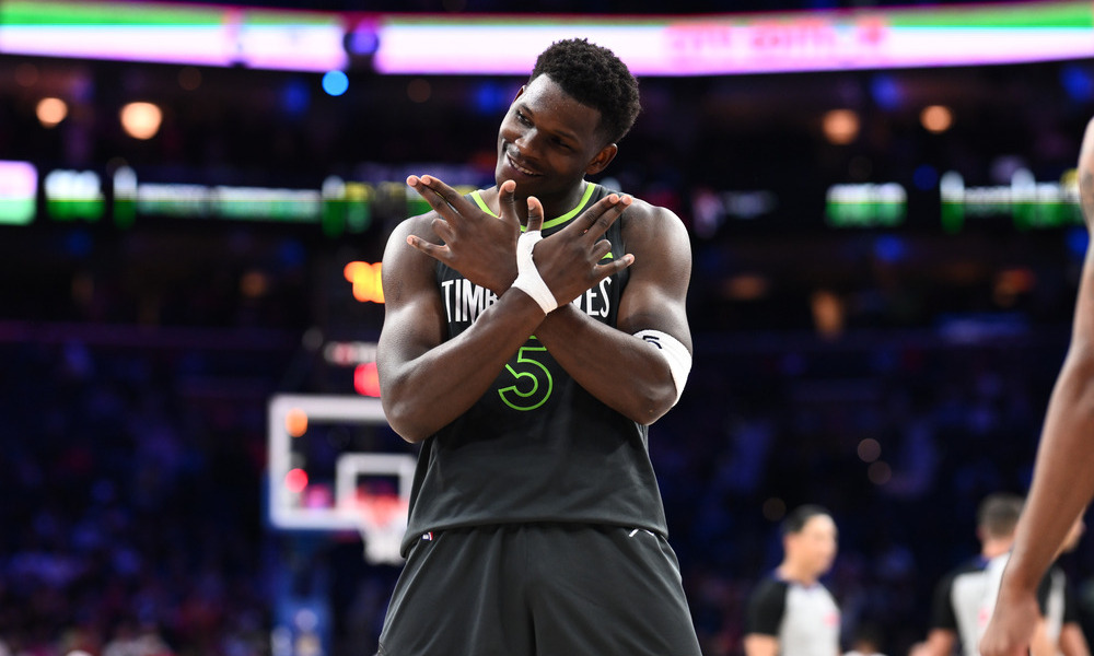 Anthony Edwards celebrates after making a basket.