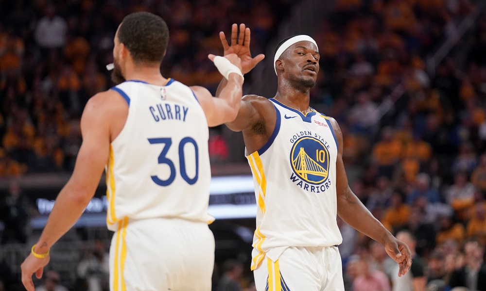Curry slaps Butler's hand