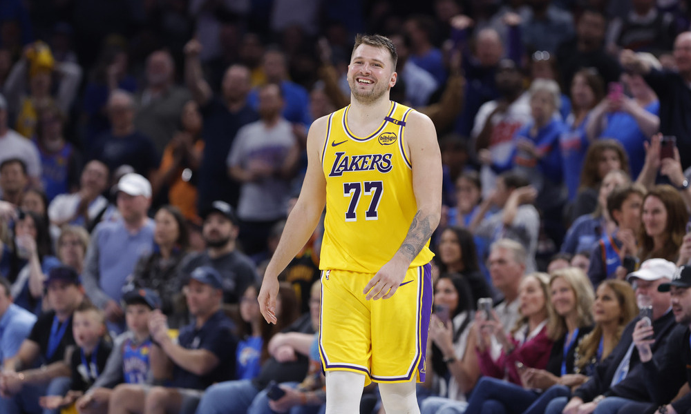 Luka Doncic smiles in between plays.