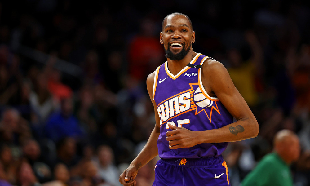 Kevin Durant running back on defense.