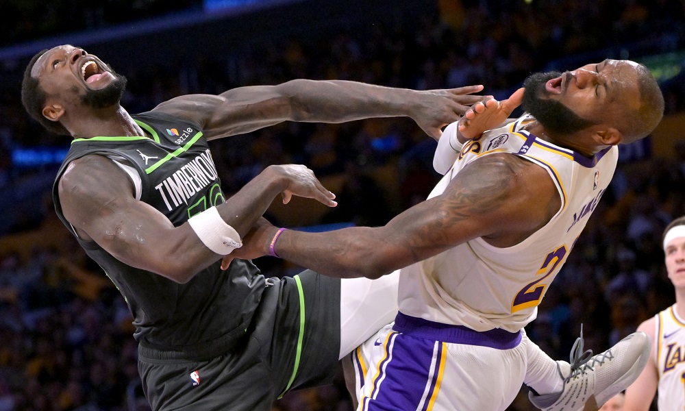 LeBron James reacts after taking an elbow from Julius Randle