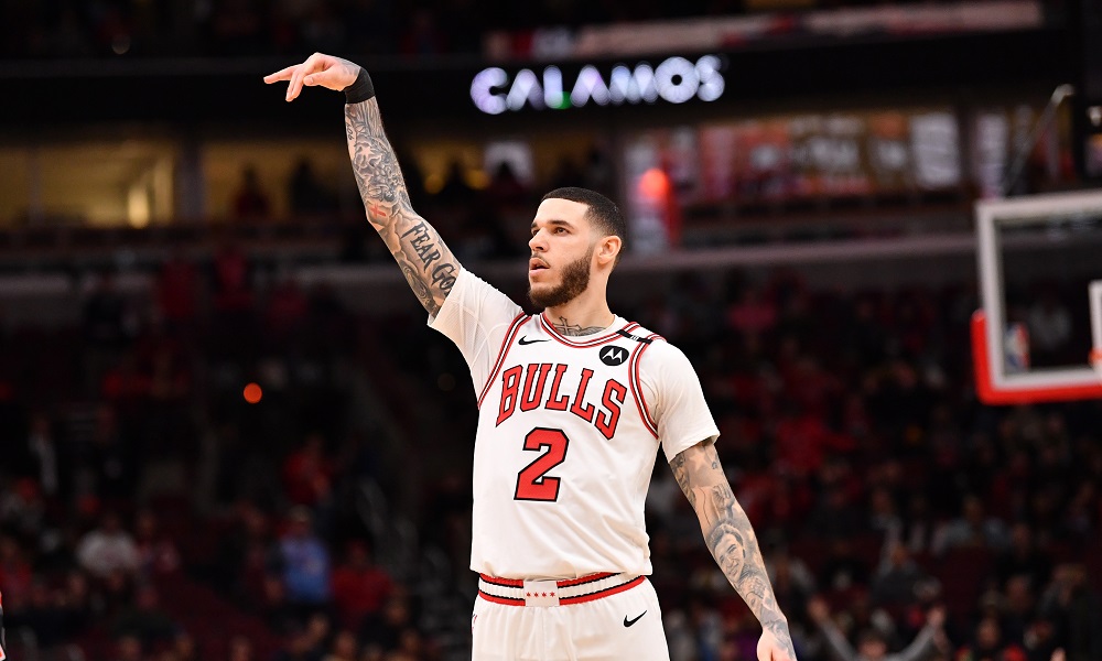 Lonzo poses after a shot