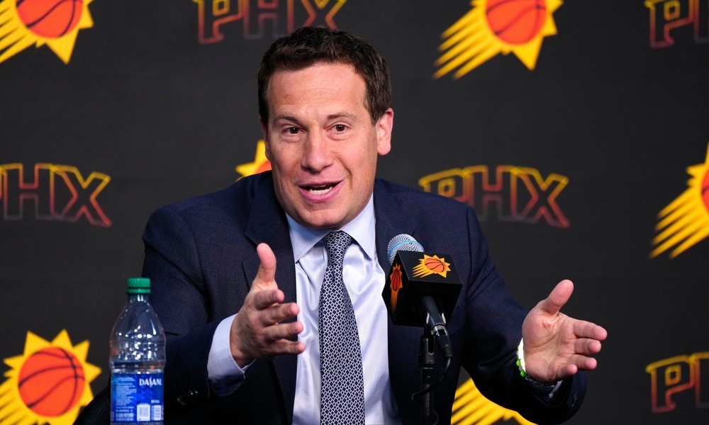 Mat Ishbia addresses reporters during a press conference.