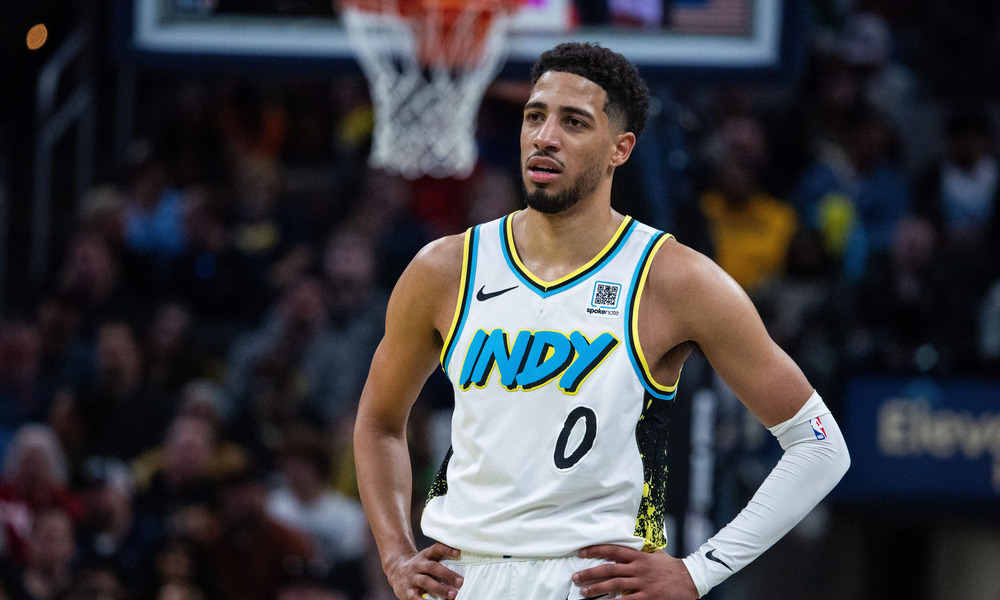 Tyrese Haliburton catching his breath during a stoppage of play.