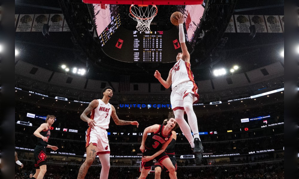 Tyler Herro drives for a layup