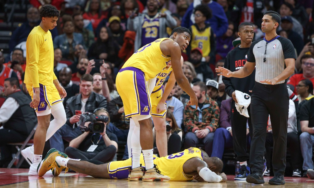 LeBron James lies on the floor with an injury