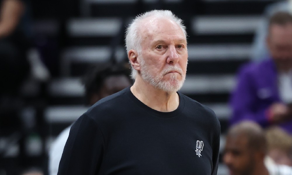 Coach Gregg Popovich watches game