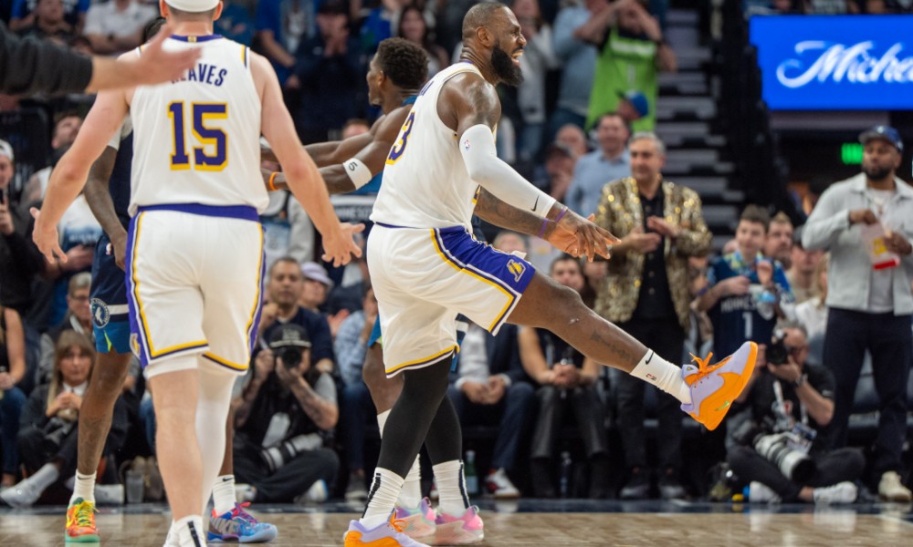 LeBron James kicks his leg out during a game.