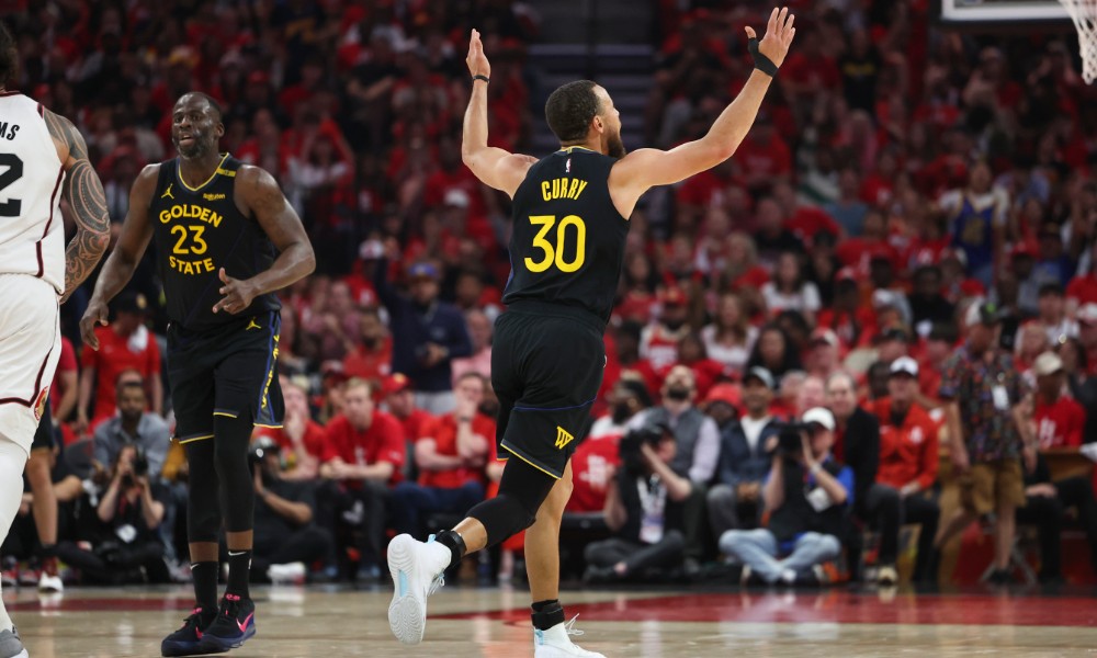 Stephen Curry reacts after making shot