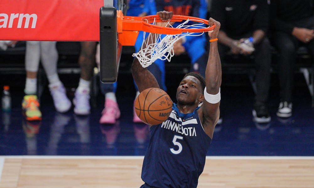 Minnesota Timberwolves' Anthony Edwards slam dunks during Game 3