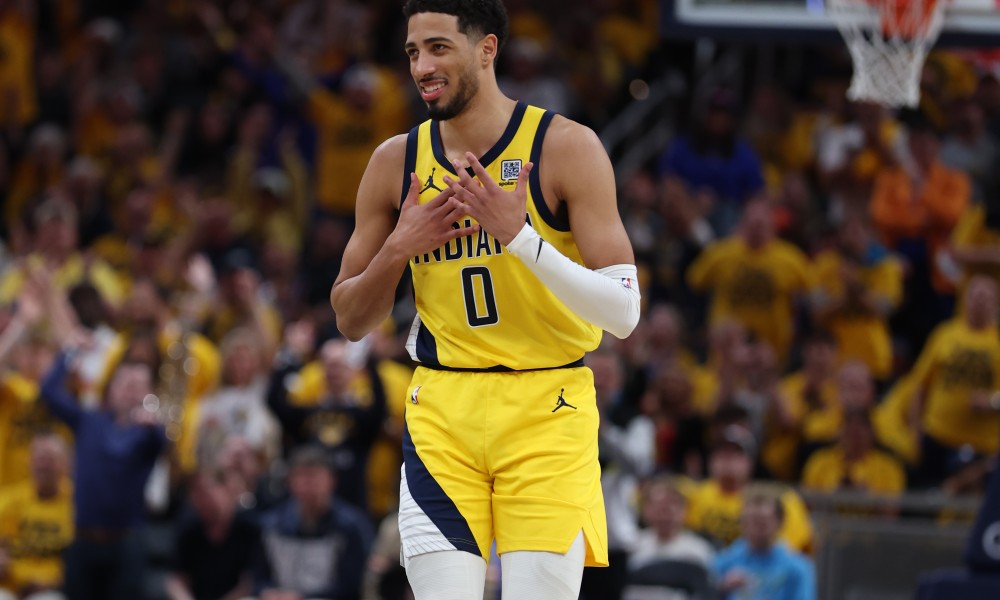 Tyrese Haliburton laughs during playoff game.