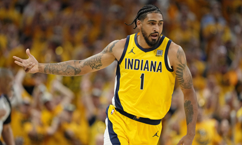 Obi Toppin celebrating after making a shot.