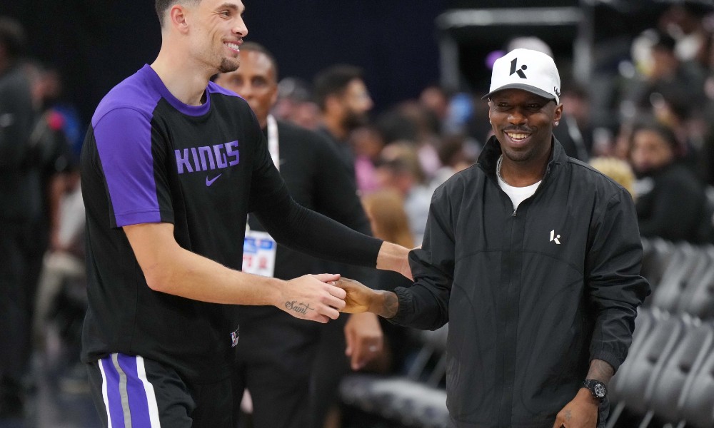 Rich Paul laughs with Zach LaVine