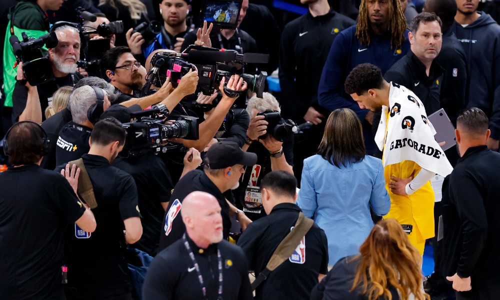 Reporters surround Tyrese Haliburton after Game 1 of the NBA Finals