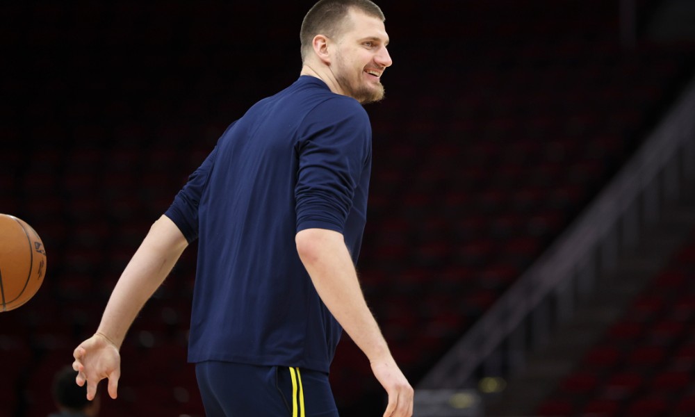 Nikola Jokic smiles before game