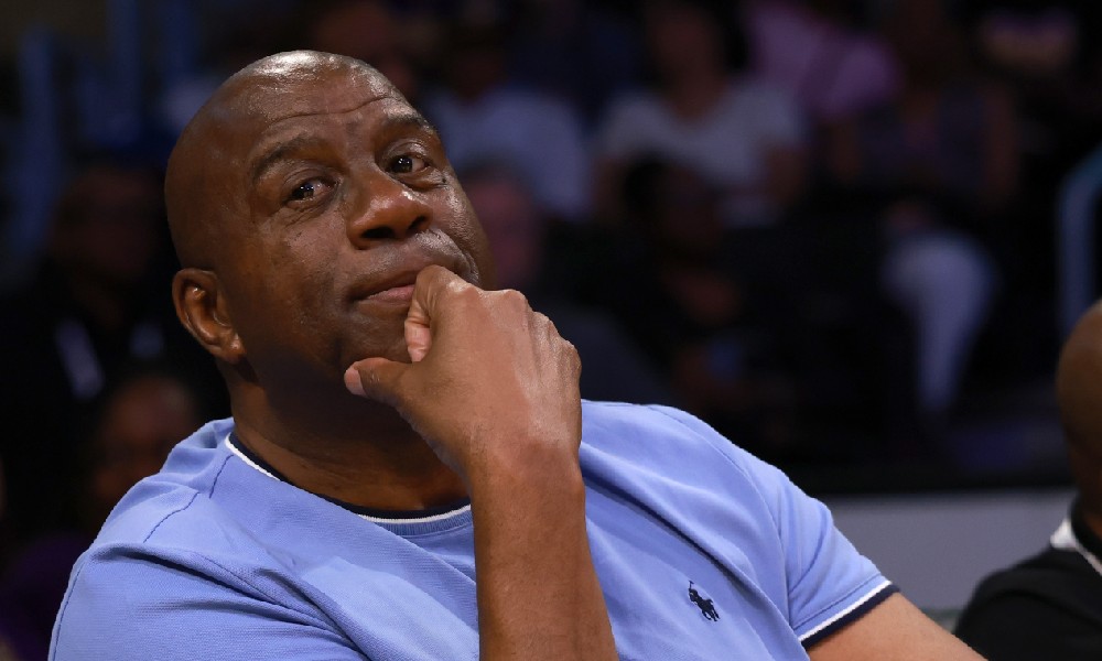 Magic Johnson watches game