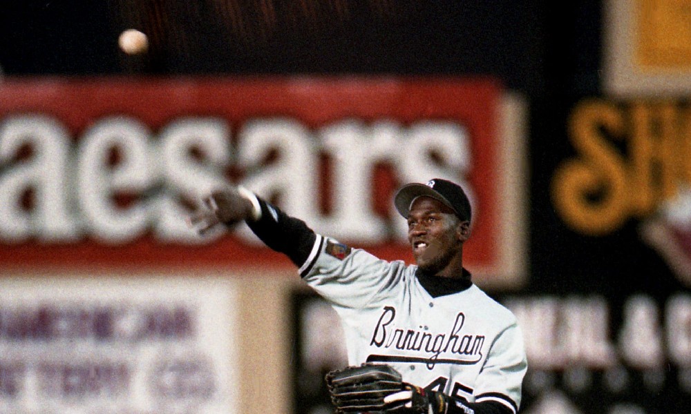 Michael Jordan throws baseball
