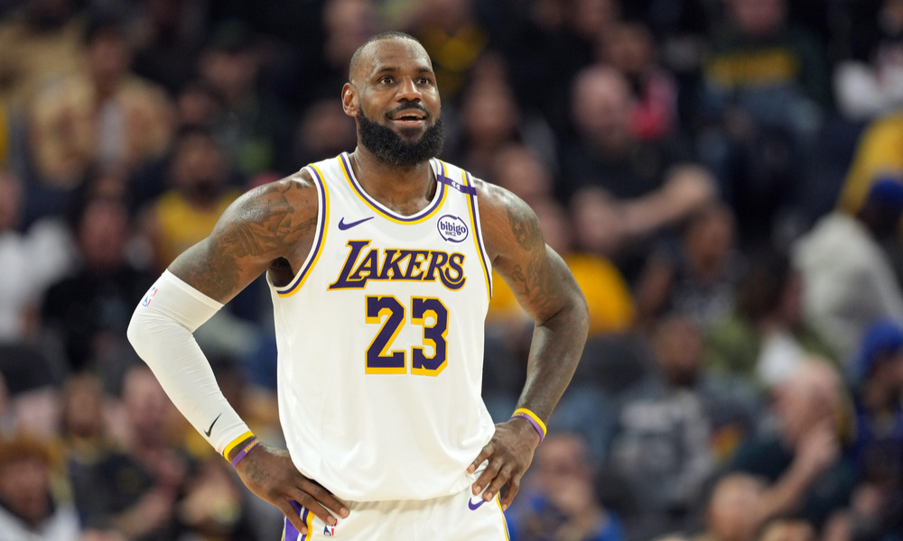 Closeup shot of LeBron James smiling during a stoppage of play.